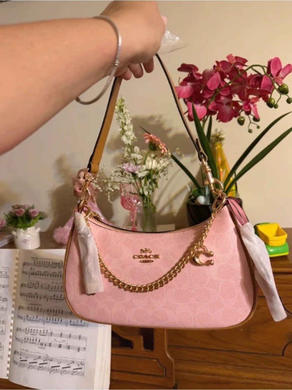 Coach Pink Shoulder Bag with Gold Chain Accent